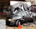 New York: Banksy strikes again, this time behind barbed wire